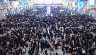 Travellers wait for their trains at Hangzhou East railway station during the Spring Festival travel rush ahead of the Chinese Lunar New Year, in Hangzhou, Zhejiang province, China January 20, 2023. China Daily via Reuters