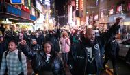 Protesters rally against the fatal police assault of Tyre Nichols, at Times Square in New York City, on January 27, 2023.  (Photo by Yuki IWAMURA / AFP)