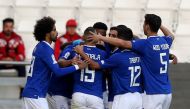 Al Sadd players celebrate after Baghdad Bounedjah scored against Al Markhiya during their QNB Stars League Round 12 match, yesterday. PICTURES: Abdul Basit