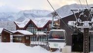 Rescue workers ride a gondola at a ski resort as they take part in a search for missing skiers following an avalanche the previous day, in the village of Otari in Nagano Prefecture, central Japan, Jannuary 30, 2023, in this photo taken by Kyodo. Mandatory credit Kyodo via REUTERS