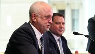 Graham Arnold (L) speaks to the media during a press conference announcing the Australian men's football team head coach in Sydney on January 30, 2023. (Photo by Muhammad FAROOQ / AFP)