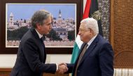 Palestinian President Mahmud Abbas (right) and US Secretary of State Antony Blinken shake hands following their meeting in Ramallah in the occupied West Bank, on January 31, 2023. (Photo by RONALDO SCHEMIDT / POOL / AFP)