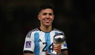 Argentina's Enzo Fernandez, Chelsea's latest signing,  poses with his Best Young Player award during the award ceremony of the FIFA World Cup Qatar 2022 at the Lusail Stadium in Lusail, Qatar on December 18, 2022.  File photo / Reuters
