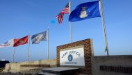 In this file photo taken on September 07, 2021, shows a sign for Camp Justice in Guantanamo Bay Naval Base, Cuba. (Photo by Paul Handley / AFP)