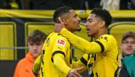 Dortmund's French forward Sebastien Haller (L) celebrates scoring the 3-1 goal with teammate Dortmund's English midfielder Jude Bellingham during the German first division Bundesliga football match between Borussia Dortmund v SC Freiburg in Dortmund, western Germany, on February 4, 2023. SASCHA SCHUERMANN / AFP