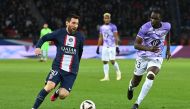 Paris Saint-Germain's forward Lionel Messi fights for the ball with Toulouse's French defender Moussa Diarra during the French L1 match between Paris Saint-Germain (PSG) and Toulouse FC at the Parc des Princes stadium in Paris on February 4, 2023. (Photo by Alain JOCARD / AFP)