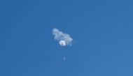 The suspected Chinese spy balloon drifts to the ocean after being shot down off the coast in Surfside Beach, South Carolina, US, February 4, 2023. (REUTERS/Randall Hill)