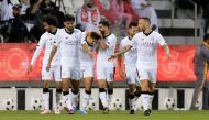 Al Sadd's players celebrate after Baghdad Bounedjah scored their second goal against Al Arabi, on Thursday.