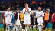 Leeds United's defender Maximilian Wober (center) applauds fans on the pitch after the English Premier League match between Leeds United and Manchester United at Elland Road in Leeds, northern England on February 12, 2023. - Man Utd won the game 2-0. (Photo by Oli SCARFF / AFP)