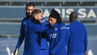 Paris Saint-Germain's Spanish defender Sergio Ramos (left) and forward Kylian Mbappe (right) take part in a training session in Saint-Germain-en-Laye, west of Paris on February 13, 2023, on the eve of the UEFA Champions League round of Last 16 First leg match against FC Bayern Munich. (Photo by FRANCK FIFE / AFP)