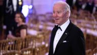 US President Joe Biden arrives for the entertainment portion of the evening after a black-tie dinner for Governors and their spouses at the White House in Washington, DC on February 11, 2023. (Photo by ANDREW CABALLERO-REYNOLDS / AFP)
 