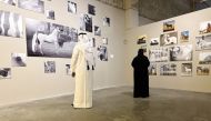 Visitors touring art exhibition “Horse Month” at Msheireb Downtown Doha. 