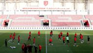 Al Duhail players during a training session, yesterday.