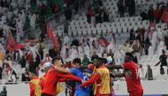 Al Duhail players celebrate at the end of their  AFC Champions League (West) 2022 match against Al Rayyan in an all-Qatar Round of 16 clash at Al Thumama Stadium in Doha on Sunday. Photos:  Salim Matramkot / The Peninsula