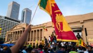 Protesters shout slogans during an ongoing anti-government demonstration near the president's office in Colombo on April 18, 2022. File photo / AFP

