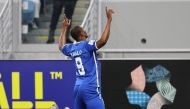 Hilal's Nigerian forward Odion Ighalo celebrates scoring his team's first goal during the AFC Champions League round of 16 match between Saudi Arabia's Al-Hilal and UAE's Shabab Al-Ahli at the Al-Janoub Stadium in Al-Wakrah, south of Doha on February 20, 2023. (Photo by KARIM JAAFAR / AFP)
