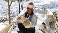 Hatmaker Youssef Akiki leaves his recently-finished Lebanese wool hats known as 