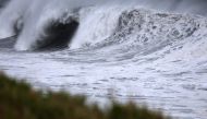 High waves crash along the shore as Cyclone Freddy nears the island at the village of Sainte-Anne, on the French overseas island of La Reunion on February 20, 2023. (Photo by Richard BOUHET / AFP)