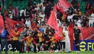 Al Duhail players and officials celebrate after their historic win yesterday. 