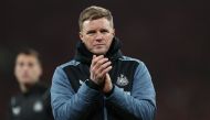 Newcastle United's English head coach Eddie Howe applauds supporters on the pitch after the English League Cup final football match between Manchester United and Newcastle United at Wembley Stadium, north-west London on February 26, 2023. - Manchester United beat Newcastle 2-0 to win League Cup (Photo by ADRIAN DENNIS / AFP)