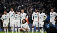 Marseille's players wait during the penalty shoutout of the French Cup quarter final football match between Olympique de Marseille and Annecy at the Velodrome stadium in Marseille, southern France, on March 1, 2023. (Photo by Nicolas TUCAT / AFP)
