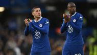 Chelsea's Argentinian midfielder Enzo Fernandez (left) and Chelsea's Swiss midfielder Denis Zakaria (right) applaud supporters on the pitch after the English Premier League match between Chelsea and Leeds United at Stamford Bridge in London on March 4, 2023. - Chelsea won the game 1-0. (Photo by JUSTIN TALLIS / AFP)