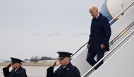 US President Joe Biden steps off Air Force One upon arrival at Delaware National Air Guard Base in New Castle, Delaware, on March 3, 2023. - Biden is scheduled to spend the weekend at his Wilmington residence. (Photo by Mandel NGAN / AFP)