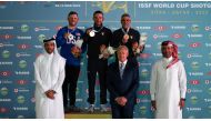 International Shooting Sport Federation (ISSF) Secretary-General Willi Grill, Qatar Shooting & Archery Association (QSAA) President Mishaal Ibrahim Al Nasr and QSAA Executive Director Jassim Shaheen Al Sulaiti with the podium winners of men's skeet. 