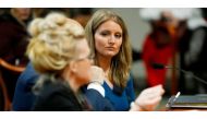 Lawyer Jenna Ellis, right, listens to Melissa Carone, who was working for Dominion Voting Services, as she speaks in front of the Michigan House Oversight Committee in Lansing, Mich., on December 2, 2020.Jeff Kowalsky/AFP via Getty Images
