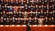In this file photo taken on March 06, 2023 China's President Xi Jinping (bottom) arrives for the second plenary session of the National People's Congress (NPC) with other Chinese leaders at the Great Hall of the People in Beijing.  (Photo by Greg Baker / AFP)