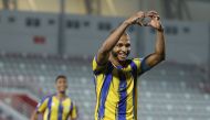 Al Gharafa's Yacine Brahimi celebrates after scoring a goal. 