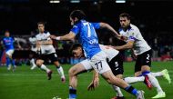 Napoli's Georgian forward Khvicha Kvaratskhelia (centre) outflanks Atalanta's Danish defender Joakim Maehle (rear centre) and Atalanta's Italian defender Rafael Toloi (right) during the Italian Serie A football match between Napoli and Atalanta on March 11, 2023 at the Diego-Maradona stadium in Naples. (Photo by Filippo MONTEFORTE / AFP)
 