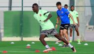 Al Duhail’s Almoez Ali (left) during a training session. 