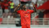 Al Duhail's Michael Olunga celebrates after scoring his second goal yesterday.