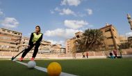 Egyptian female field hockey players attend a training session in al-Zagzig city, at Sharqiya governorate, northeast of Cairo, on March 6, 2023. (Photo by Khaled Desouki 
/ AFP)