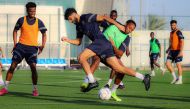 Al Duhail players in action during a training session, yesterday.