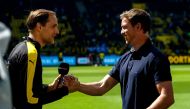(FILES) This file photo taken on May 6, 2017 shows then Dortmund's head coach Thomas Tuchel (L) and then Hoffenheim's head coach Julian Nagelsmann shaking hands prior to the German first division Bundesliga football match between Borussia Dortmund and TSG 1899 Hoffenheim in Dortmund, western Germany. 
