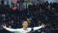 Portugal's forward Cristiano Ronaldo celebrates after scoring his team's first goal during the UEFA Euro 2024 group J qualification football match between Luxembourg and Portugal at the Stade de Luxembourg, in Luxembourg, on March 26, 2023. Photo by Kenzo TRIBOUILLARD / AFP
