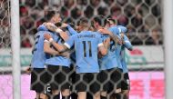 Uruguay's players celebrate a goal by teammate Sebastian Coates Nion against South Korea during a friendly football match between South Korea and Uruguay in Seoul on March 28, 2023. Photo by JUNG YEON-JE / AFP