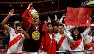 Peru's supporters cheer prior the friendly football match between Morocco and Peru at the Wanda Metropolitano stadium in Madrid on March 28, 2023. (Photo by JAVIER SORIANO / AFP)
