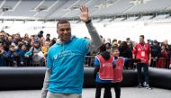 Paris Saint-Germain's and France's international football team French forward Kylian Mbappe takes part in a football match with children from the 