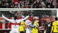 Stuttgart's Congolese midfielder Silas (C) celebrates after scoring the 2-2 equalizing goal during the German first division Bundesliga football match between VfB Stuttgart and Borussia Dortmund in Stuttgart, southwestern Germany on April 15, 2023. (Photo by THOMAS KIENZLE / AFP)
