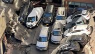 This image courtesy of @MobileHealthInc shows a collapsed parking garage in lower Manhattan, New York, April 18, 2023. Photo by MobileHealthInc / AFP
