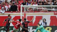 Mainz' Luxembourgish midfielder Leandro Barreiro (2nd L) scores the 2-1 goal past Bayern Munich's Swiss goalkeeper Yann Sommer (R) during the German first division Bundesliga football match between Mainz 05 and FC Bayern Munich in Mainz on April 22, 2023. (Photo by Daniel ROLAND / AFP) 