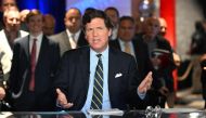 In this file photo taken on November 17, 2022 Tucker Carlson speaks during 2022 FOX Nation Patriot Awards at Hard Rock Live at Seminole Hard Rock Hotel & Casino Hollywood in Hollywood, Florida. (Photo by Jason Koerner / GETTY IMAGES NORTH AMERICA / AFP)
