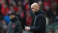 File photo: Manchester United's Dutch manager Erik ten Hag makes notes during the English Premier League match between Liverpool and Manchester United at Anfield in Liverpool, north west England on March 5, 2023. (Photo by Paul ELLIS / AFP)

