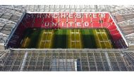 An aerial file photo taken on November 23, 2022 shows Old Trafford stadium, home ground of to Manchester United football team, in Manchester, northern England. (Photo by Oli SCARFF / AFP)


