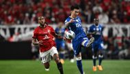 Hilal's Jang Hyun-soo (R) and Urawa Reds' Jose Kante vie for the ball during the second leg of the AFC Champions League final between Urawa Red Diamonds and Al-Hilal at Saitama Stadium in Saitama on May 6, 2023. (Photo by Philip Fong / AFP)