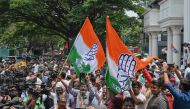 Congress supporters celebrate the party's victory in the Karnataka state legislative assembly election in Bengaluru on May 13, 2023. (Photo by Manjunath Kiran / AFP)