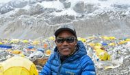 In this file photo taken on May 2, 2021, Nepal's mountaineer Kami Rita Sherpa poses for a picture at the Everest base camp in the Mount Everest region of Solukhumbu district. (Photo by Prakash Mathema / AFP)